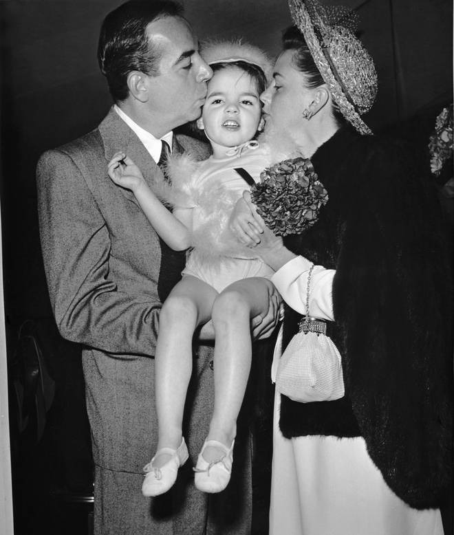 Liza Minnelli, in the arms of her parents, Vincente Minnelli and Judy Garland.